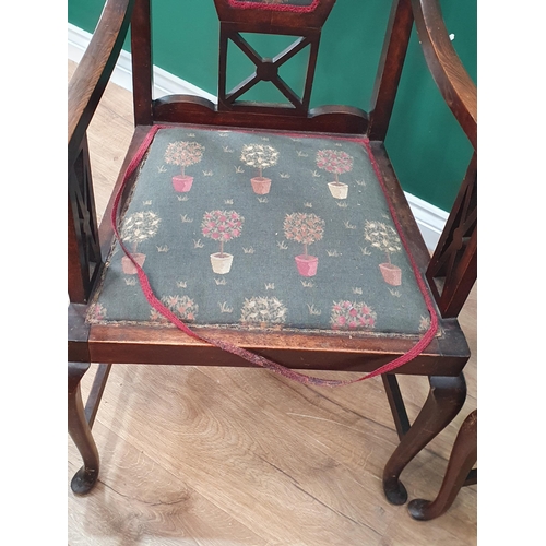 772 - A pair of mahogany framed Elbow Chairs with green tree design upholstery on cabriole supports A/F.