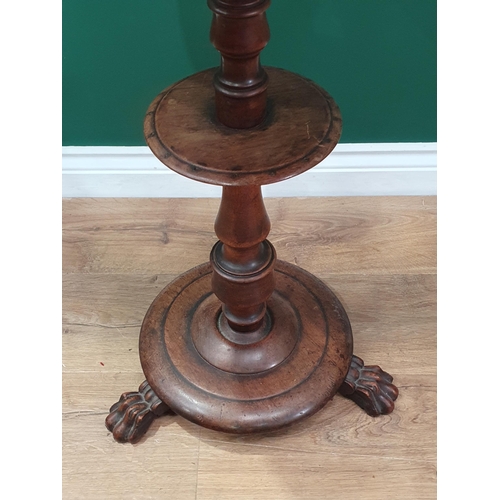 788 - A 19th Century mahogany Lamp Table on turned column with lower tier on three paw feet 2ft 4in H x 1f... 