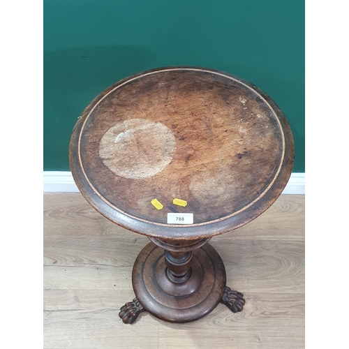 788 - A 19th Century mahogany Lamp Table on turned column with lower tier on three paw feet 2ft 4in H x 1f... 