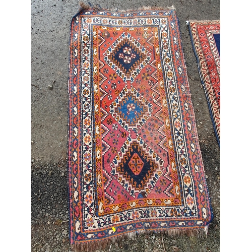 853 - A blue ground multi-border Persian Rug with three central motifs, 5ft 7in x 4ft 1in and another red ... 