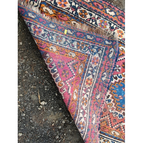 853 - A blue ground multi-border Persian Rug with three central motifs, 5ft 7in x 4ft 1in and another red ... 