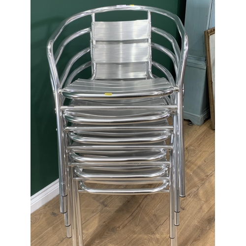 681 - A set of six aluminium Stacking Chairs