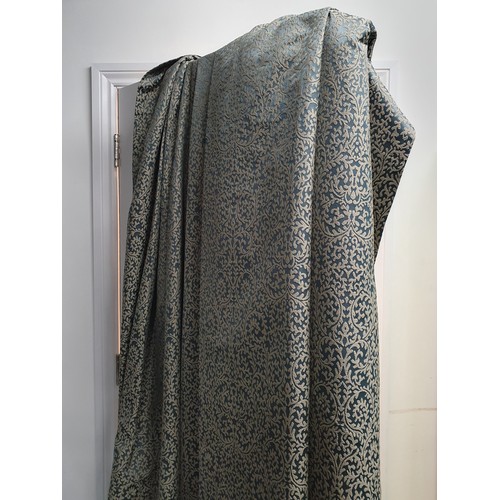 76 - A pair of large fine quality Curtains with pale blue and cream leafage scroll design, lined and weig... 