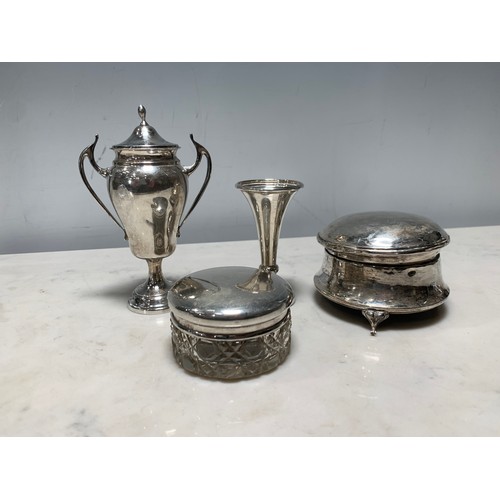 131 - A George V silver small two-handled Urn and Cover, Birmingham 1929, a silver Spill Vase, a circular ... 