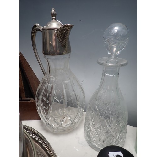 390 - A silver plated Spirit Kettle on stand, Ewer with plated lid, Decanter, Vases, Tray, Pens, Paperweig... 