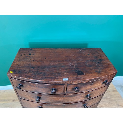 19 - A 19th Century mahogany bow fronted Chest of two short and three long drawers on splayed feet 3ft 6i... 