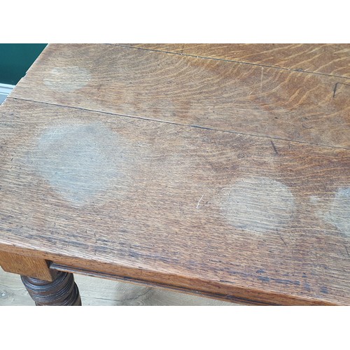 489 - A 19th Century oak Kitchen Table with plank top fitted frieze drawer (one frieze drawer missing) and... 