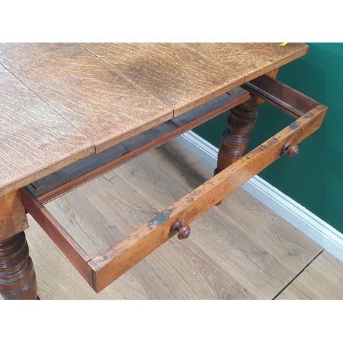 489 - A 19th Century oak Kitchen Table with plank top fitted frieze drawer (one frieze drawer missing) and... 