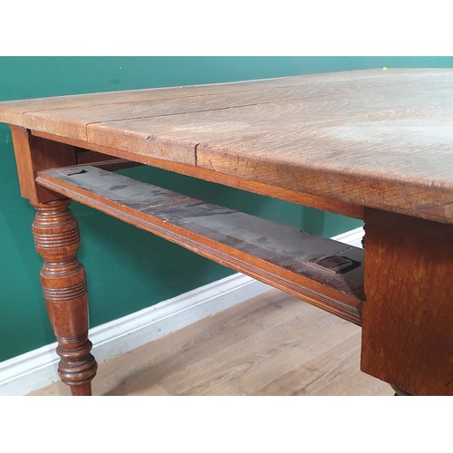 489 - A 19th Century oak Kitchen Table with plank top fitted frieze drawer (one frieze drawer missing) and... 