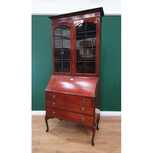 523 - A mahogany veneered Bureau Bookcase fitted three drawers mounted on cabriole supports 6ft 8in H x 3f... 