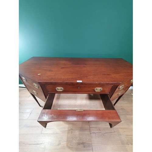 570 - A 19th Century mahogany Sideboard, the shaped front fitted an arrangement of four drawers on squared... 