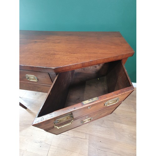 570 - A 19th Century mahogany Sideboard, the shaped front fitted an arrangement of four drawers on squared... 