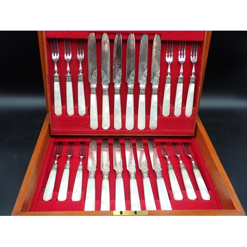 116 - One dozen silver mounted Dessert Knives and Forks with engraved plated blades and mother-of-pearl ha... 