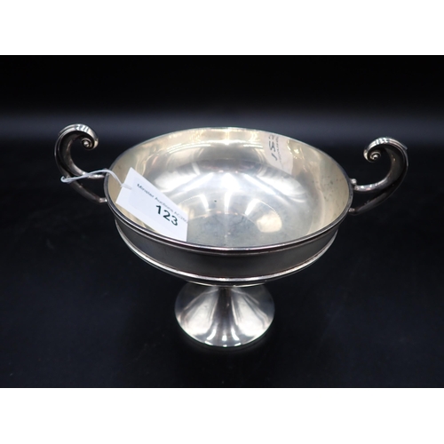 123 - A George V silver Trophy with twin scroll handles on pedestal base, London 1907, 165gms