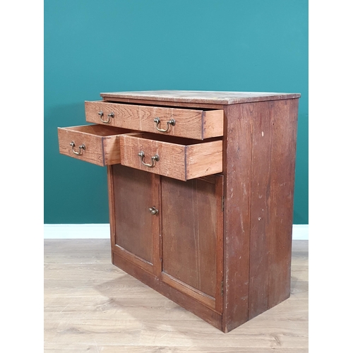 13 - An oak Cupboard fitted single long drawer over two short drawers, above pair of panelled doors, 3ft ... 