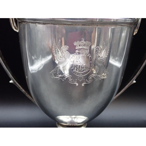 139 - A George III silver two handled Trophy engraved coat of arms and motto, London 1811, maker: William ... 