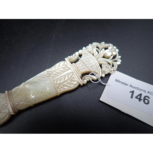 146 - A fine quality mother-of-pearl Paperknife carved and engraved with a basket of flowers