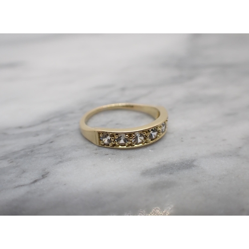 158 - A half Eternity Ring pavé-set seven old-cut white stones in 18ct gold, ring size M