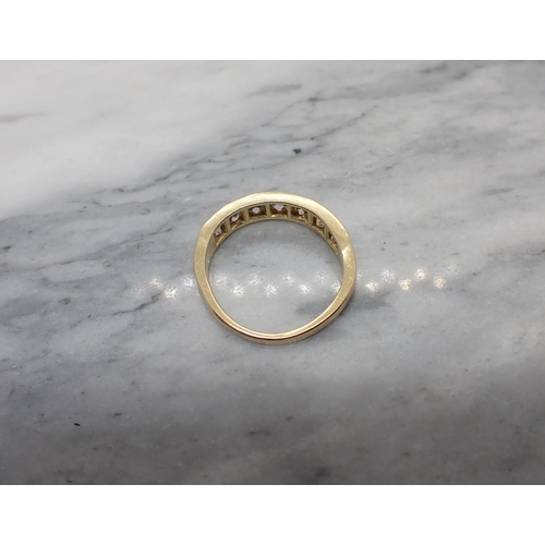 158 - A half Eternity Ring pavé-set seven old-cut white stones in 18ct gold, ring size M