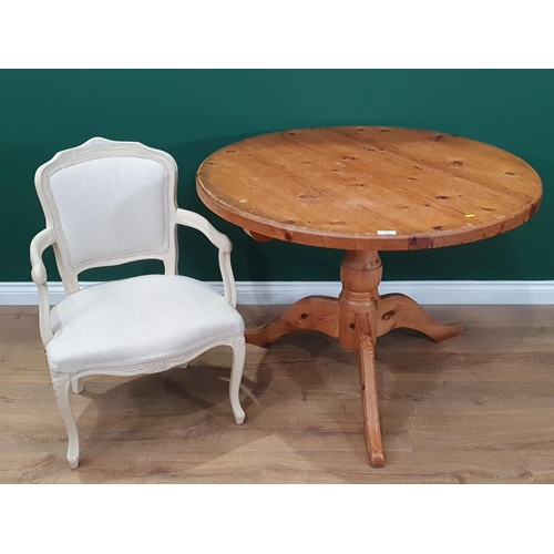 16 - A circular pine Kitchen Table on tripod base 3ft 6