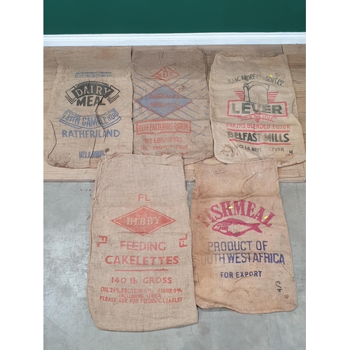 20 - Five hessian Sacks with various advertising logos (some repairs).