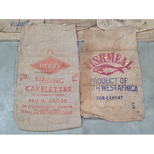 20 - Five hessian Sacks with various advertising logos (some repairs).