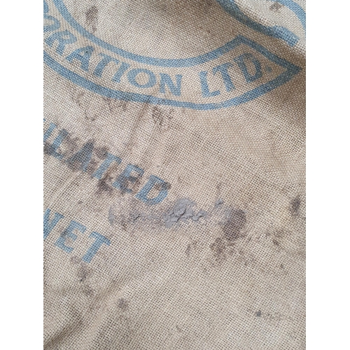 21 - Five hessian Sacks with various advertising logos (some repairs).