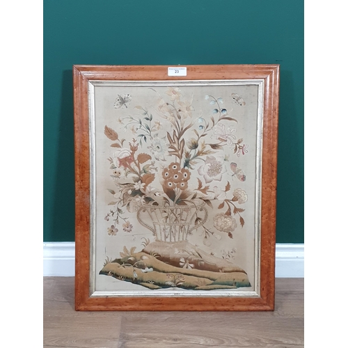 23 - An antique Silk and Needlework Panel of basket of Flowers and Insects in maple frame A/F.