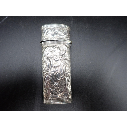 233 - An 18th Century Continental white metal Etui with floral and scroll embossing, lacks contents