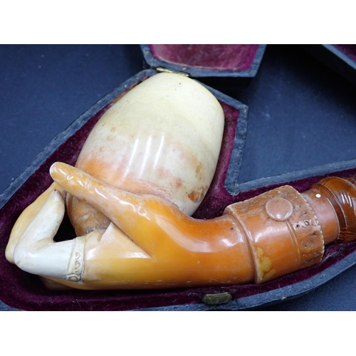 236 - A large Meerschaum Pipe carved with hand supporting bowl, and another, smaller, carved horses, A/F, ... 