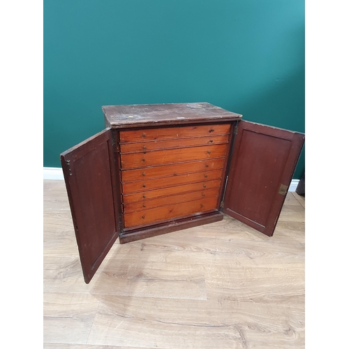 243 - A Collector's Cabinet fitted eight pine drawers enclosed by pair of cupboard doors 2ft 2in W x 2ft 2... 