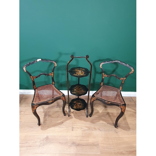 27 - A pair of lacquered chairs and a cake stand in Oriental style