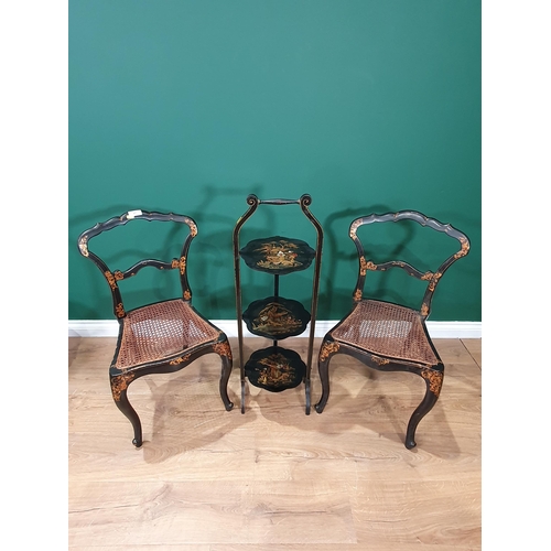 27 - A pair of lacquered chairs and a cake stand in Oriental style