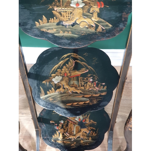 27 - A pair of lacquered chairs and a cake stand in Oriental style