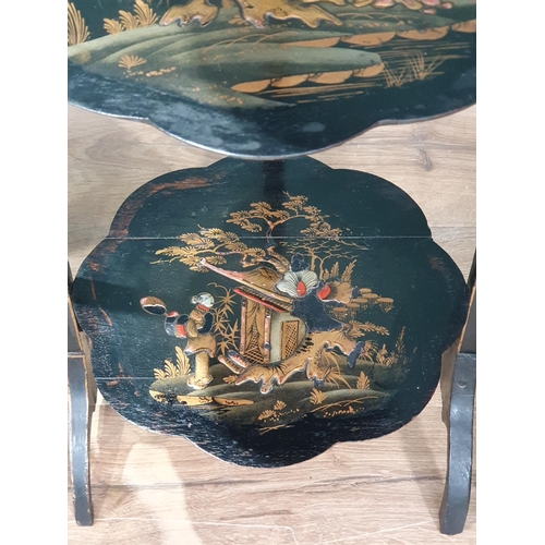 27 - A pair of lacquered chairs and a cake stand in Oriental style