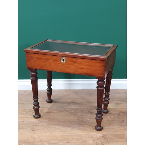 28 - A 19th century Walnut Bijouterie Display Table on Reeded supports