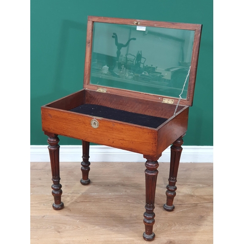 28 - A 19th century Walnut Bijouterie Display Table on Reeded supports