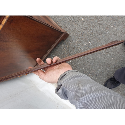 298 - A 19th Century mahogany Linen Press with dentil cornice above a pair of  panelled doors enclosing sl... 