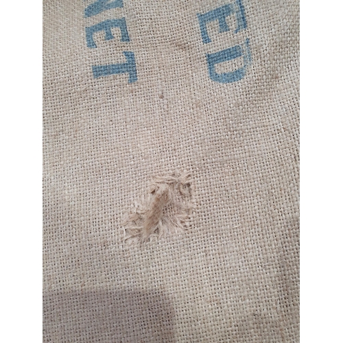 30 - Five hessian Sacks with various advertising logos (some repairs).