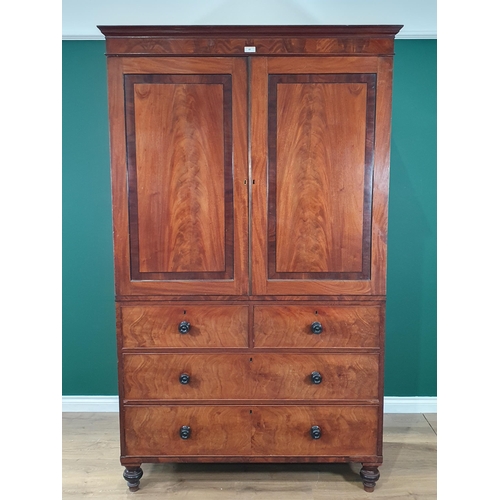 41 - A 19th Century flamed mahogany Linen Press, the cornice above pair of panelled doors enclosing five ... 