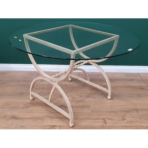 456 - A modern cream painted glass topped metal famed Circular Table with shaped, twisted supports, 3ft 11... 