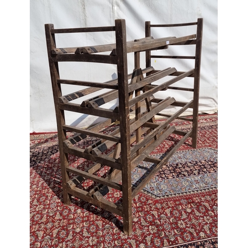 46 - A rustic wooden four tier Bakers or Cheese Rack, 4ft 4