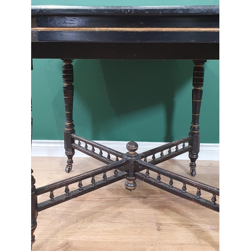 466 - An ebonised, gilt decorated Octagonal Occasional Table on turned supports and castors, 42