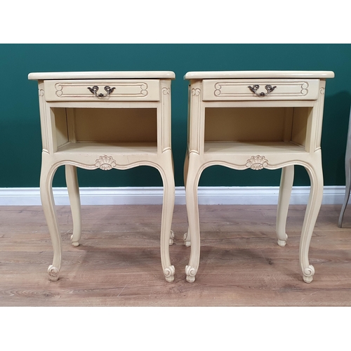 475 - A pair of yellow painted Bedside Tables, a grey painted Bedside Table and a cream upholstered Elbow ... 