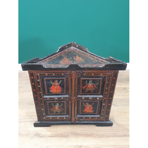 476 - An oriental hardwood Corner Cupboard the panelled doors with painted figures and floral decorations,... 