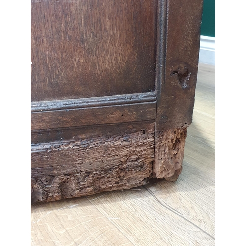 495 - An antique oak panelled Coffer with carved frieze, 3ft 9