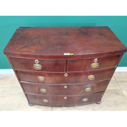 499 - A mahogany Bow Front Chest of two short, three long Drawers on circular bun feet A/F, 3ft 5