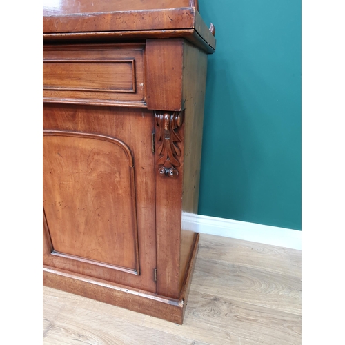 502 - A Victorian mahogany Chiffonier with pair of fitted drawers above pair of cupboard doors, 4ft 11