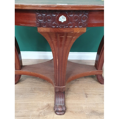 507 - A mahogany reproduction two tier Centre Table with inlaid mother of pearl decorations, on four flute... 