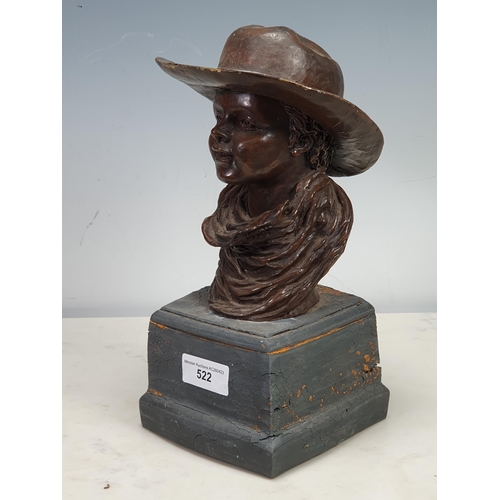 522 - A painted bronzed Figure of a Boy wearing a Hat and Neckerchief, 1ft High.